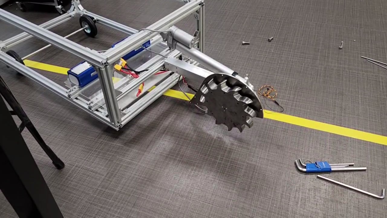 The first arm blade manufactured and mounted, with sufficient electronics for testing.